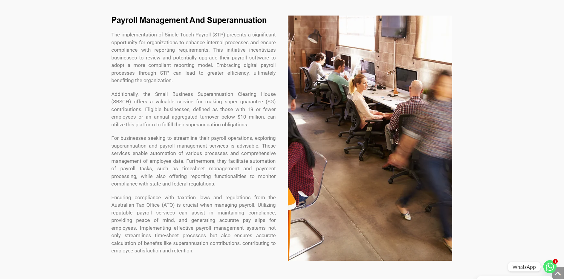 Office team working together at desks — payroll management